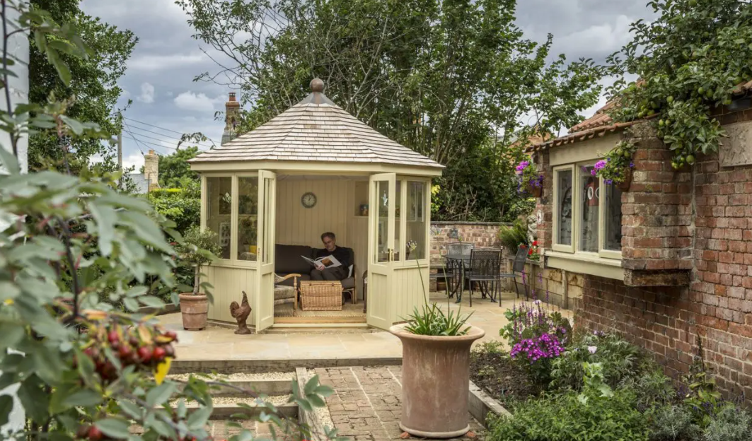 enjoying a summer house in the garden